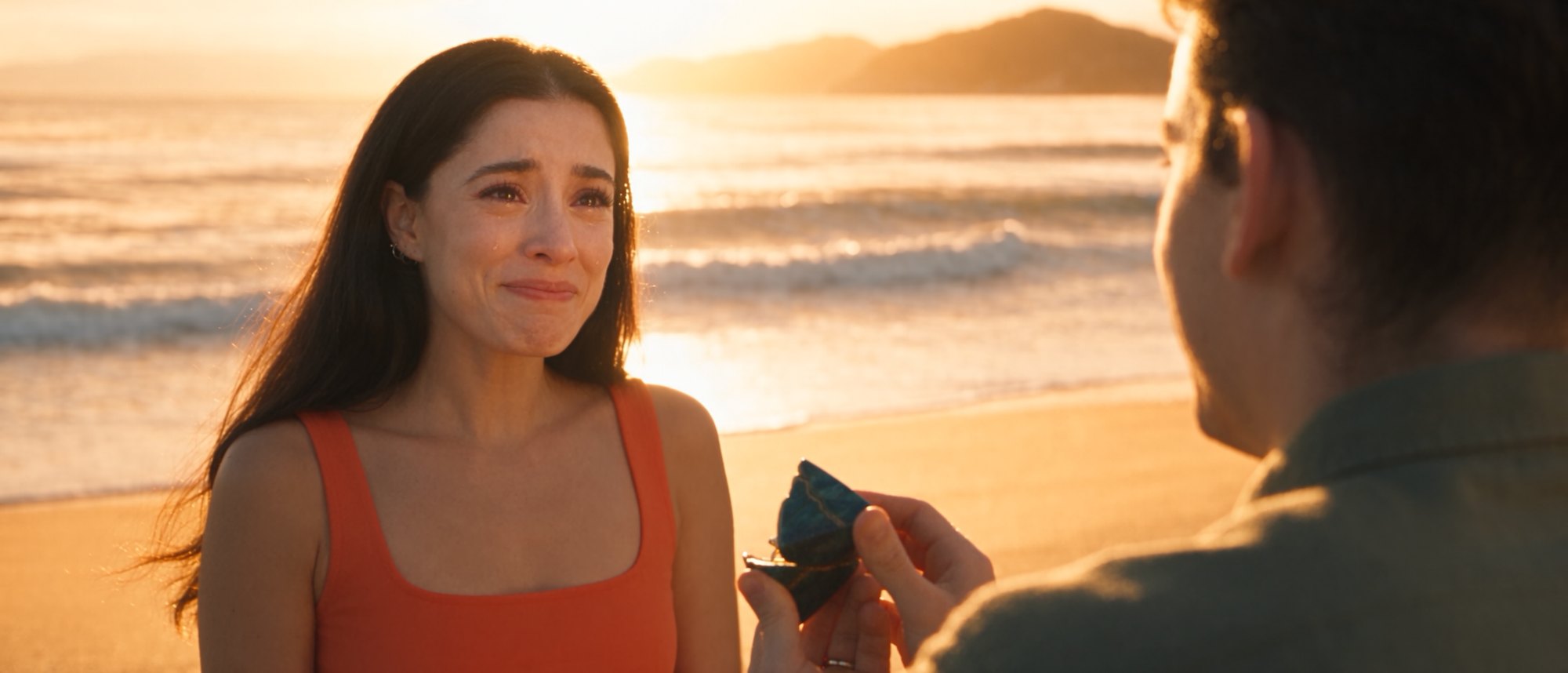 A still from Cinema as a Love Language — the proposal on the beach at Manzanillo