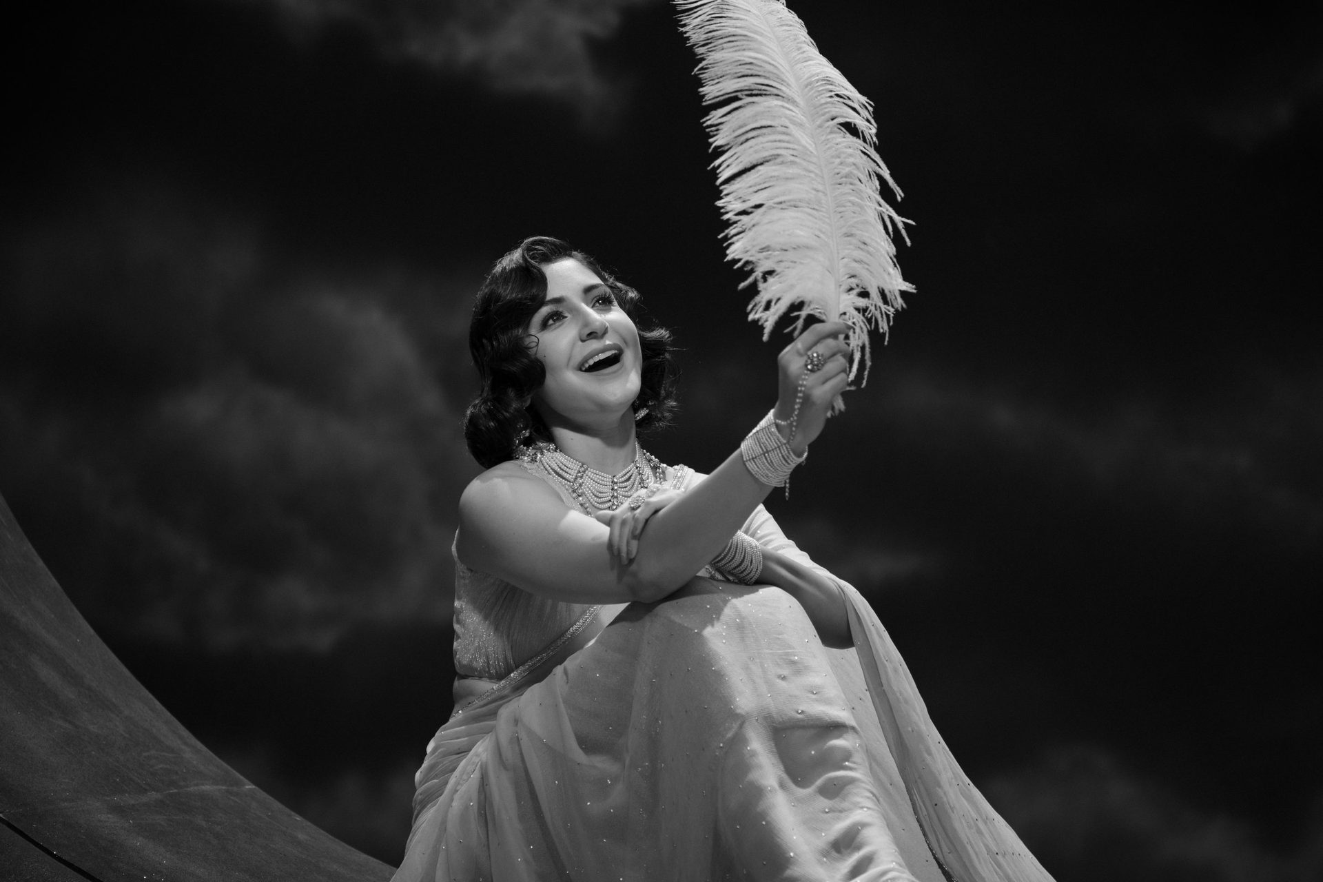 Qala (Netflix) on-set still — vintage glamour with ostrich feather, shot by Akshay Pawar for Clean Slate Films