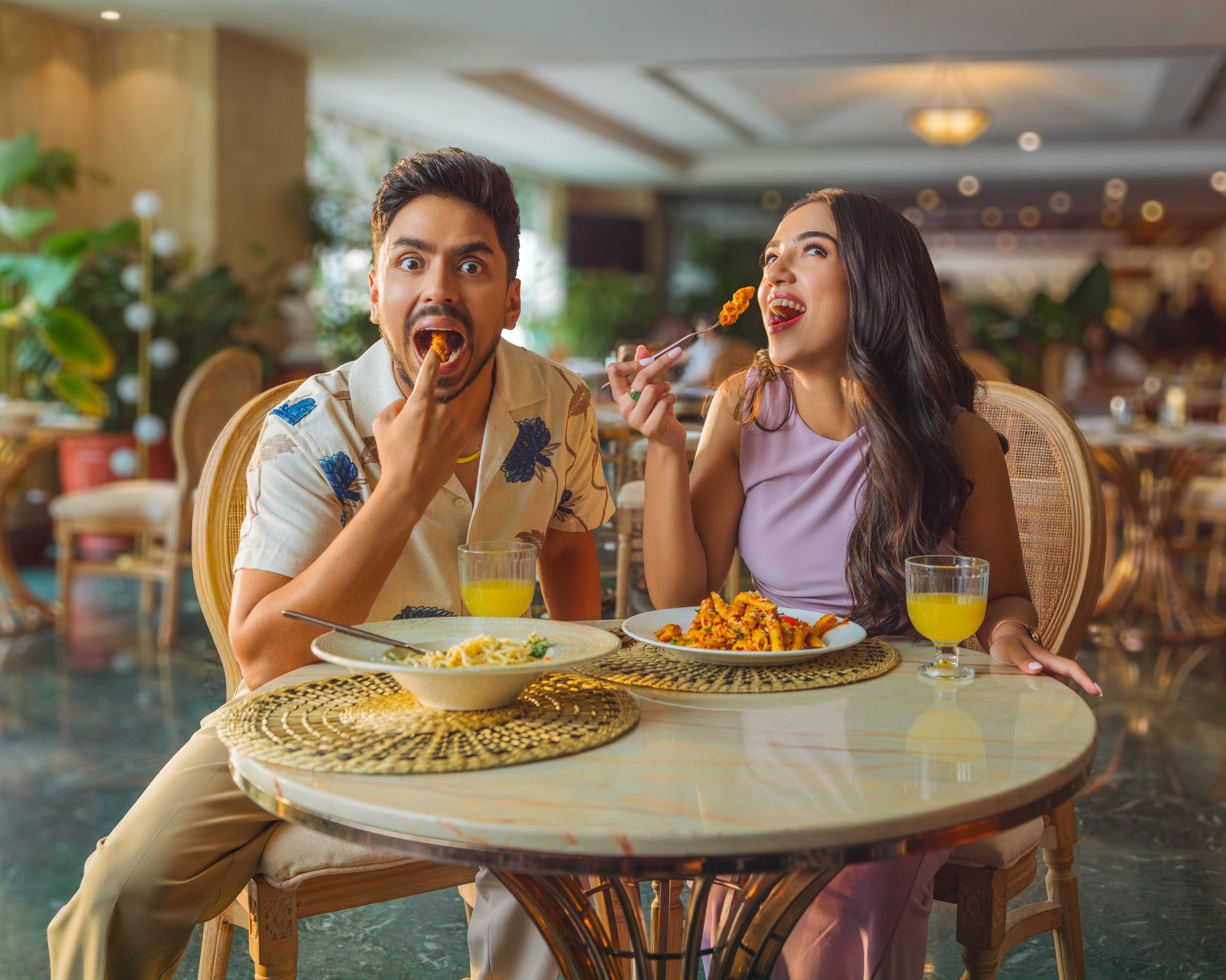 Zomato Dining Carnival campaign cover featuring Adarsh Gourav and Ahsaas Channa